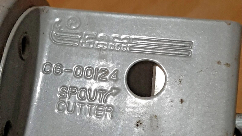 caulk gun spout cutter close up