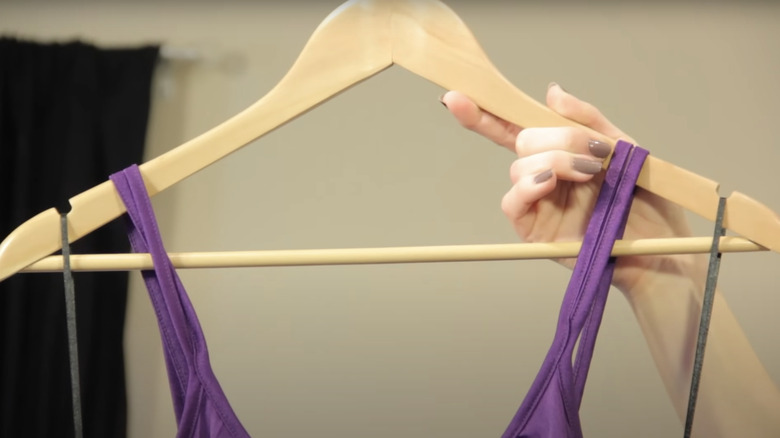 purple dress hanger loops on hanger