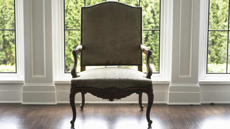 Armchair with window behind