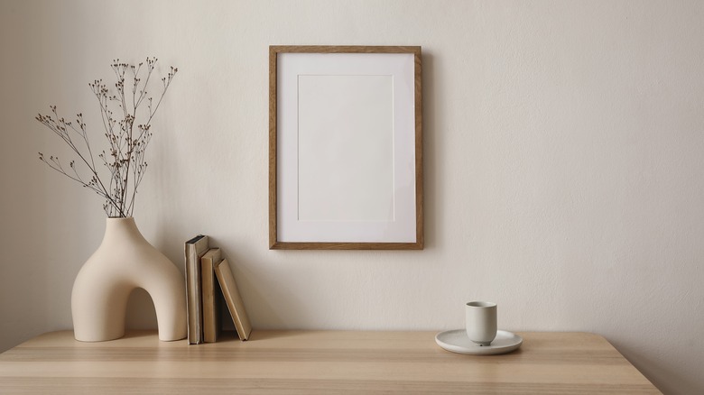 wooden picture frame on wall