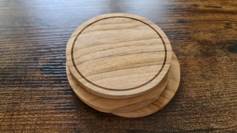 wooden coasters on table