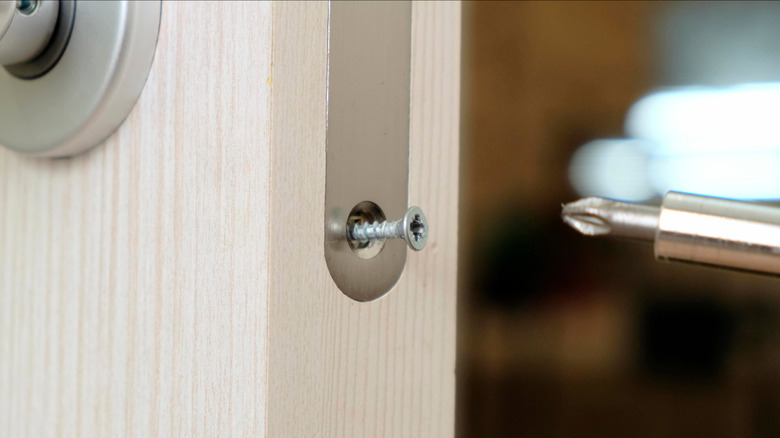 A screw in a pocket door