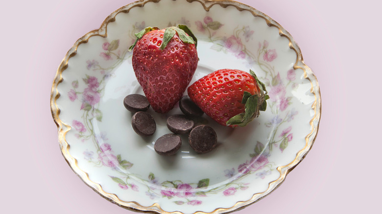 strawberries and chocolate on Haviland china plate