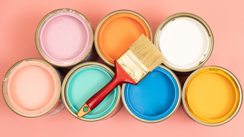 Colorful cans of paint.