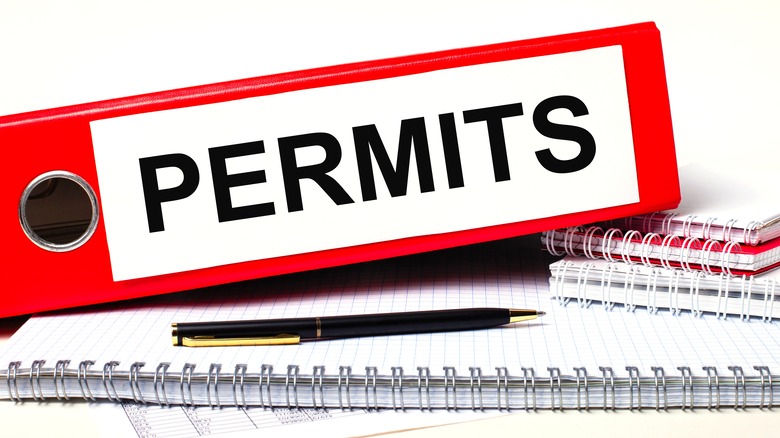 Binder and notebooks of permits