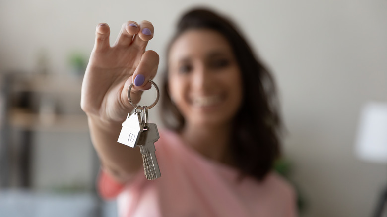 Woman holding keys