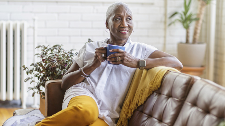 woman relaxing on couch