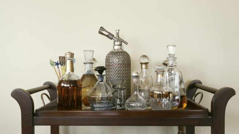 Beverage bottles on bar cart