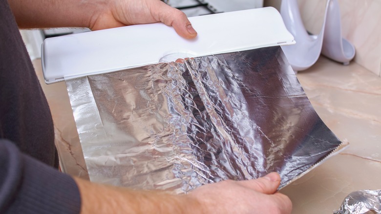 aluminum foil being pulled out