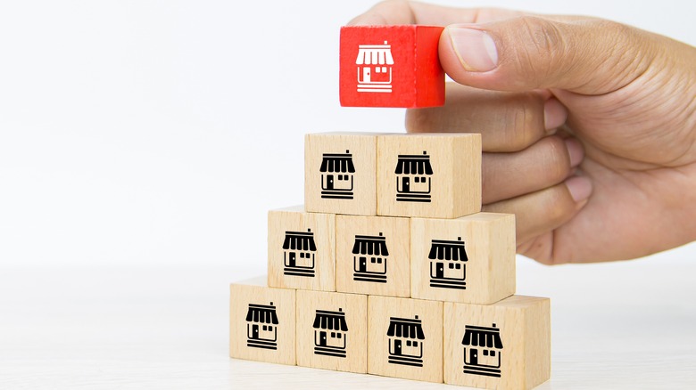 stacked cubes with store pictures