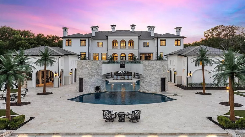 Pool and patio of mansion