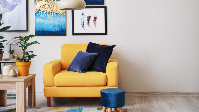 Yellow chair and blue decor