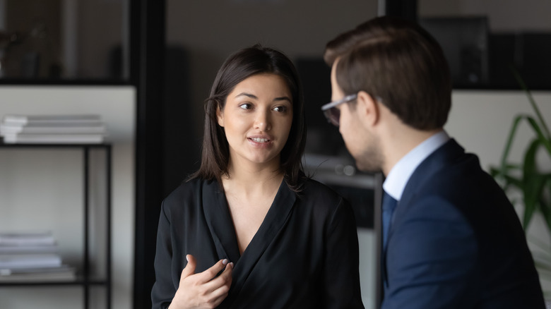 woman talking to a man 