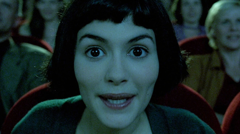 Amélie smiling while in theater