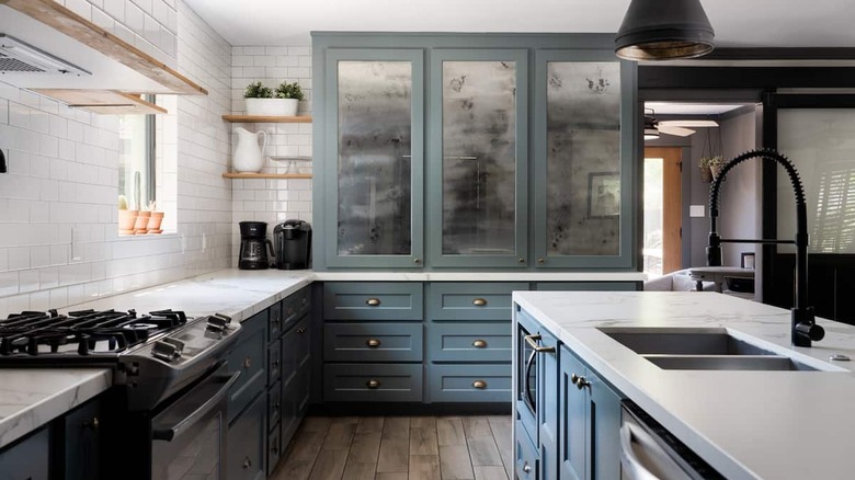 Teal cabinets in kitchen 