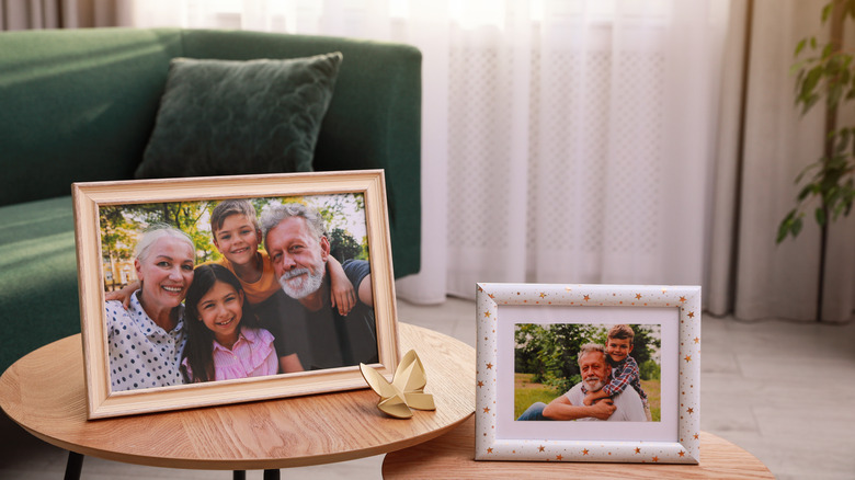 framed family photos on tables