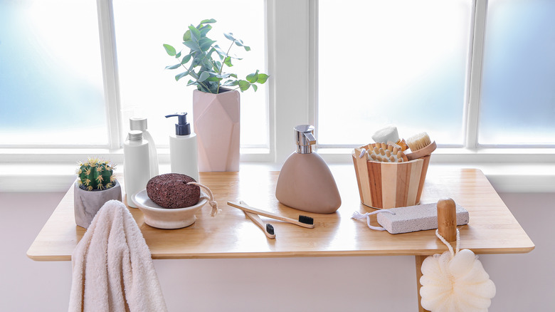 wooden shelf with bathroom supplies