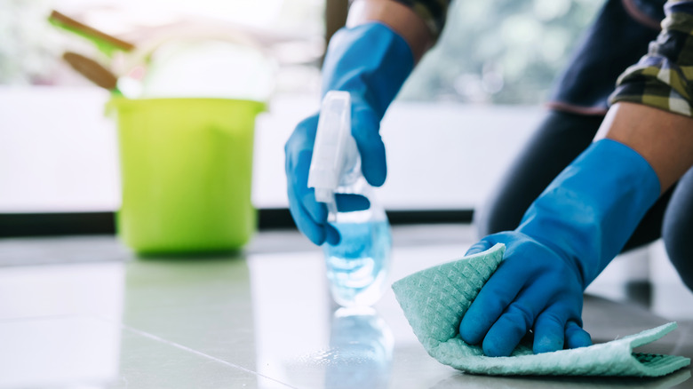 person cleaning floor