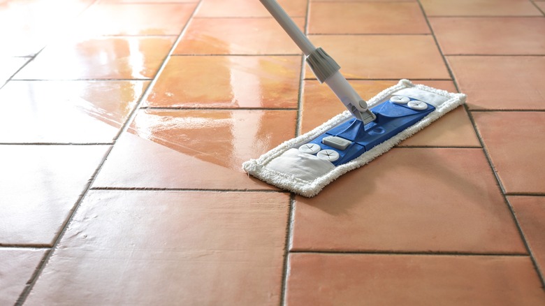 Mopping a tile floor