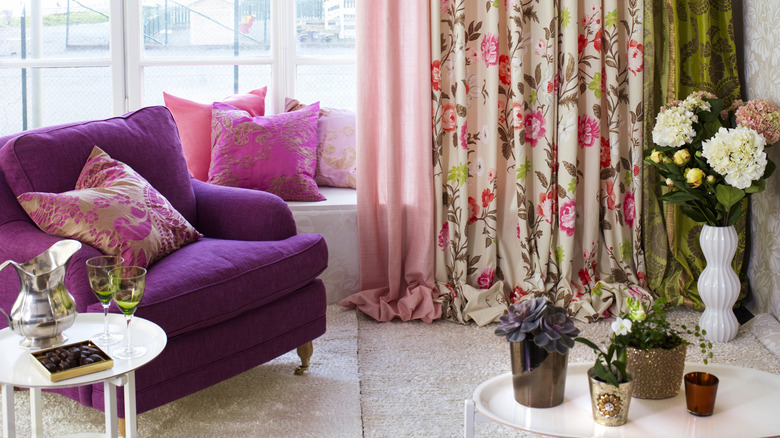 Sitting room with mixed pink and green floral curtains