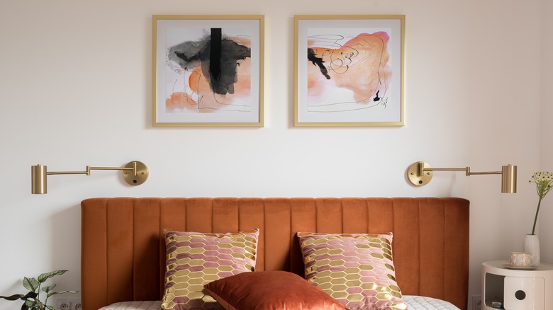 paintings above bed