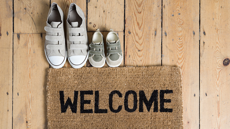 welcome mat with shoes