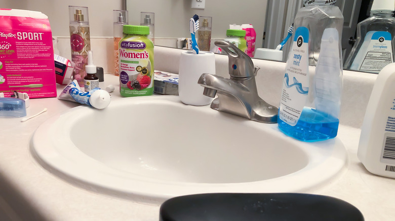 Cluttered bathroom counter