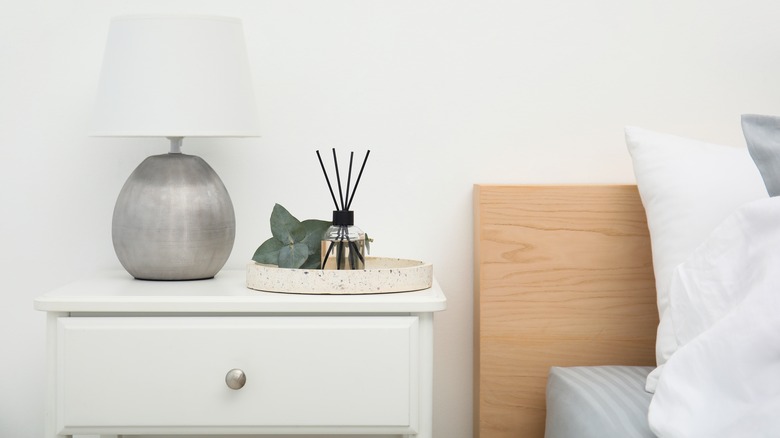 A table lamp on a nightstand