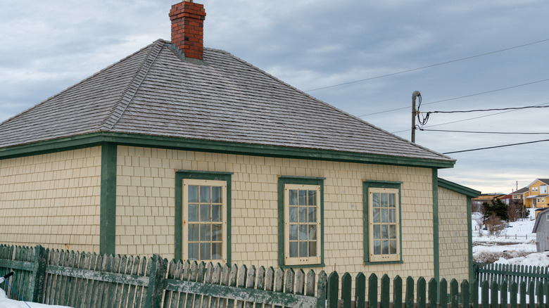 Cottage with gray hip roof