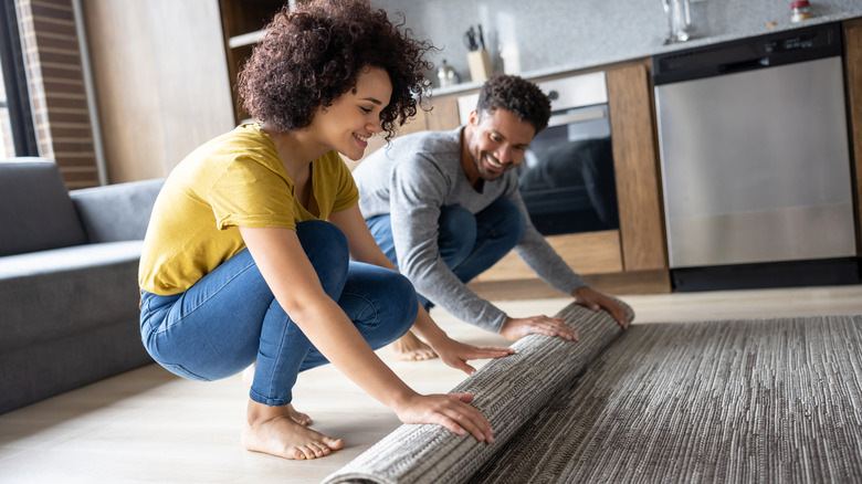 https://www.housedigest.com/img/gallery/game-changing-tips-to-keep-your-rugs-pristine/intro-1688743696.jpg