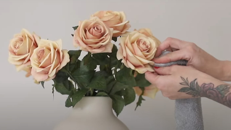 Wiping artificial flowers