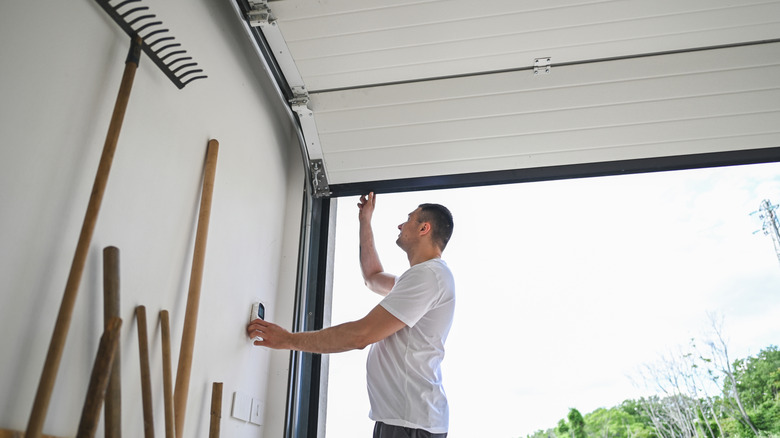 Man working on garage door opener