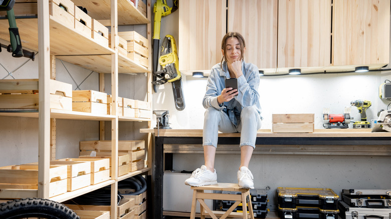 Handywoman in home workshop 