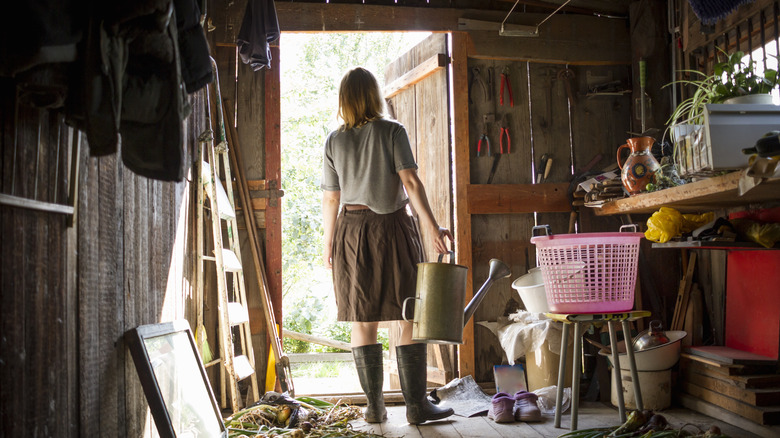 woman inside a garden shed