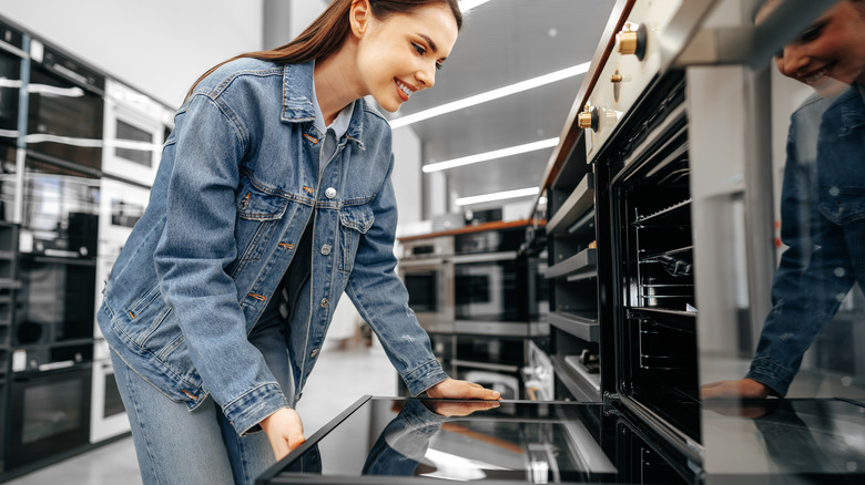 woman shopping for oven