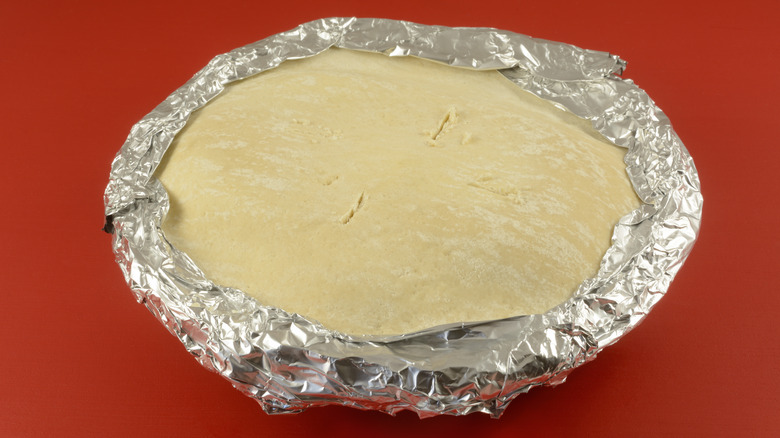 foil around the edges of a pie crust