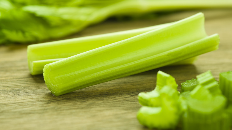 crisp celery on a cutting board