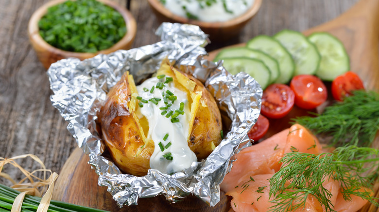 baked potato wrapped in aluminum foil