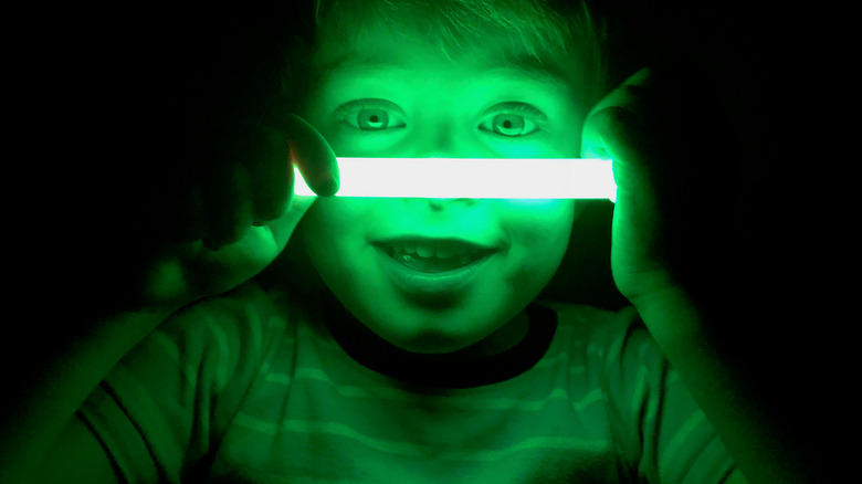 Boy with a glow stick