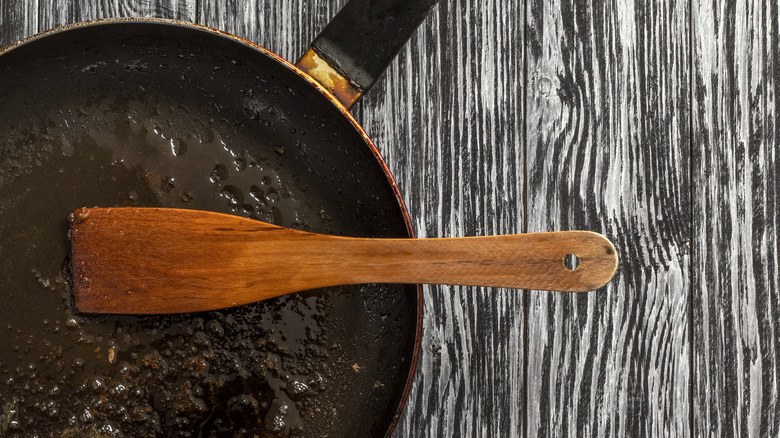 oil stained wooden spatula