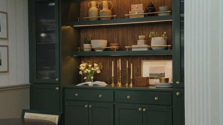 Dark green dining room hutch designed by Todryk