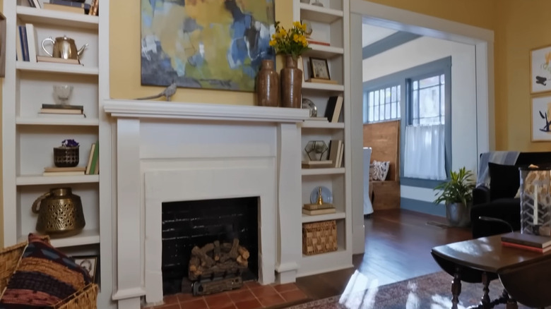 bookshelves around a fireplace on "Hometown"