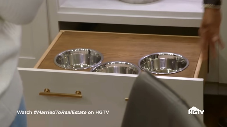 Dog feeding station on Married to Real Estate