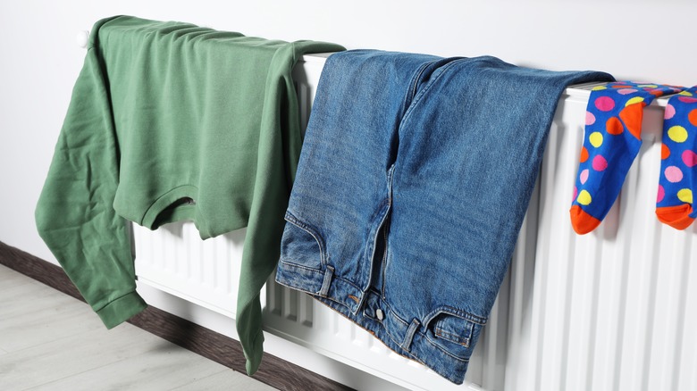 Clothes hanging over radiator