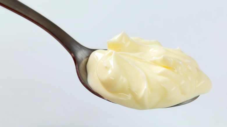 Mayonnaise on a spoon