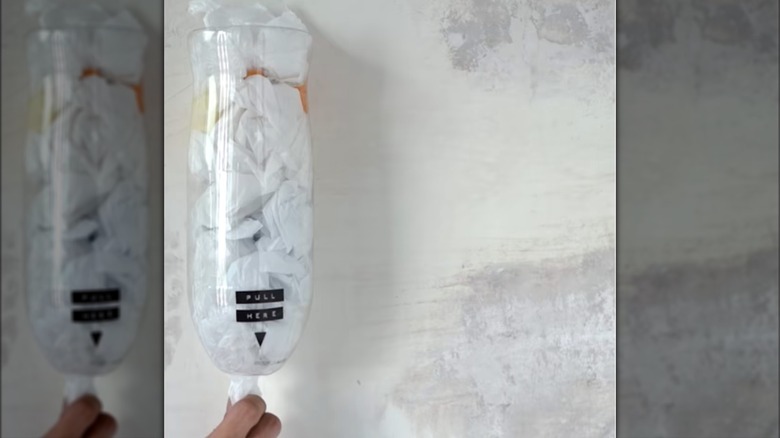 DIY plastic bag dispenser