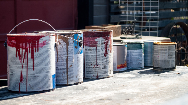 old paint cans