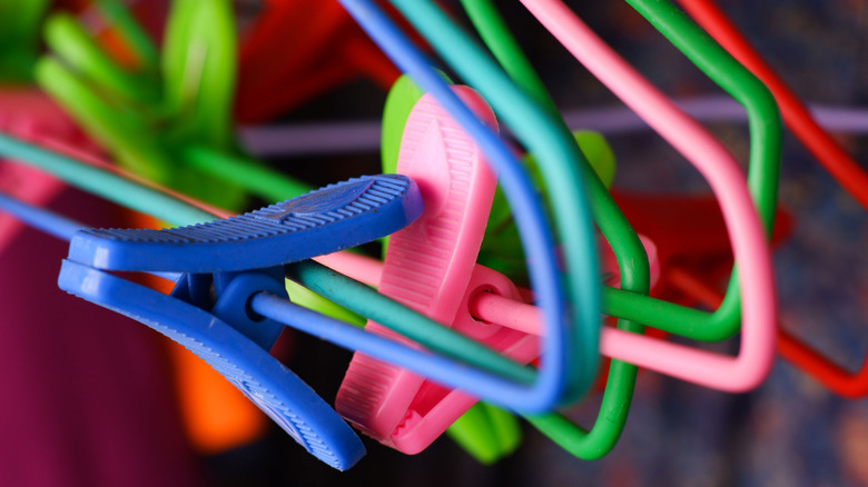 Close up of plastic hangers with clips