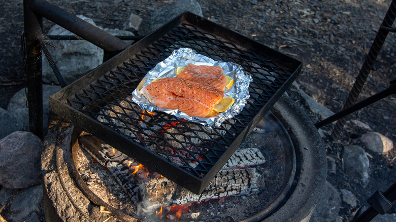 salmon on aluminum foil campfire pan