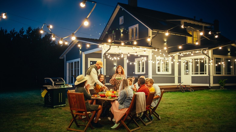 Summer barbecue party in backyard 